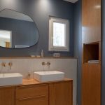 AltaMente Parents' bathroom suite - Bohemian tiled sinks and mirror