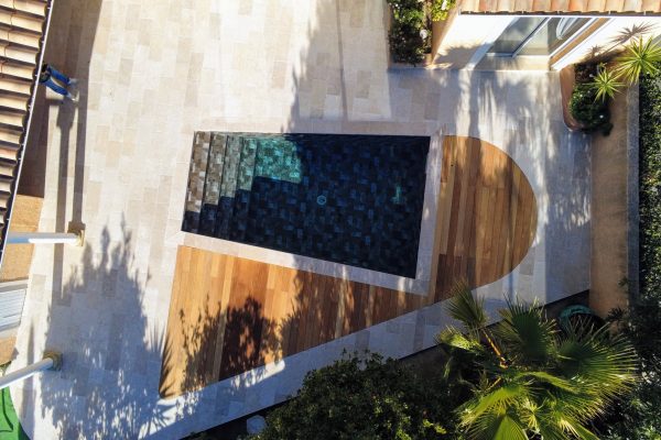 Wooden pool and travertine look