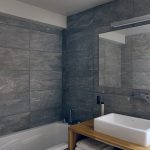 Cast tiled bath - Home by U
