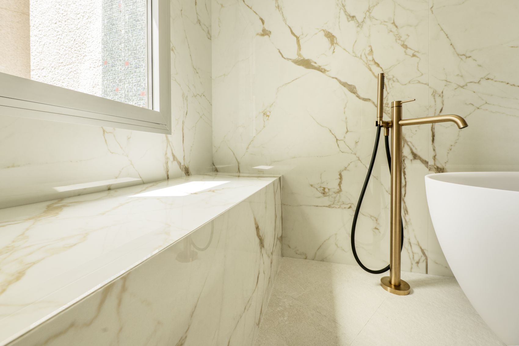 marble effect bathroom gold bathroom taps