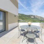Terrace with a Bali stone look - TULIP Hotels & Residences