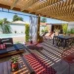 Shaded terrace with wood-effect tiles - G.Despagnet